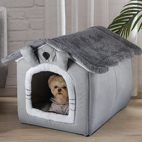 bichon couché dans niche chien intérieur grise chaleureuse