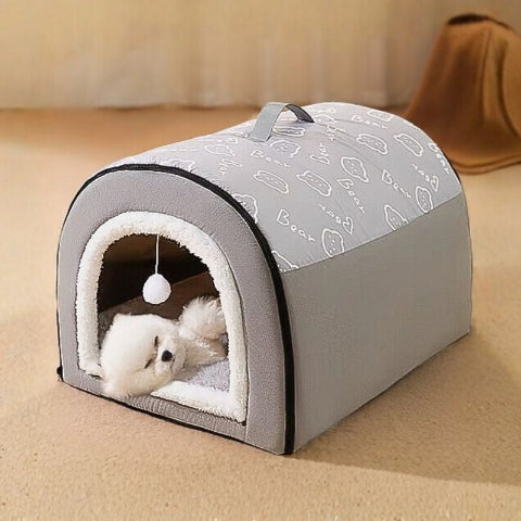caniche blanc couché dans niche chien intérieur grise convertible