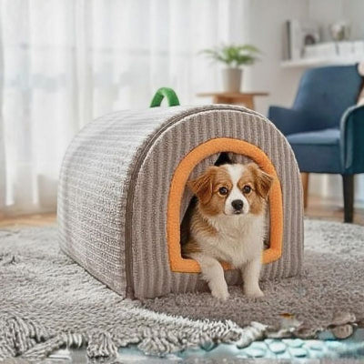 chiot couché dans niche d'intérieur pour chien kaban grise