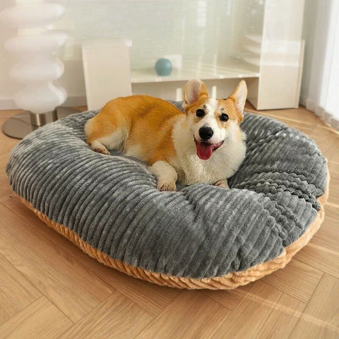 corgi allongé sur coussin dehoussable chien double face reversol