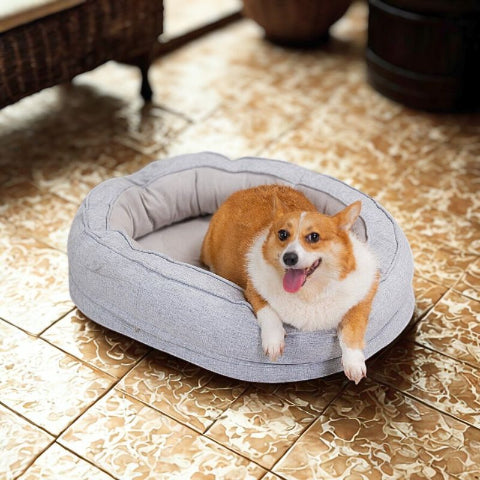 corgi couchéé dans lit pour chien gris ovalon
