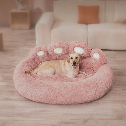 labrador couché dans panier pour chien rose patte