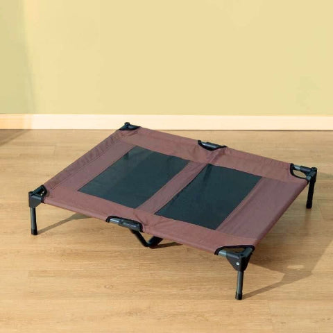 lit de camp chien marron sur plancher bondaflex