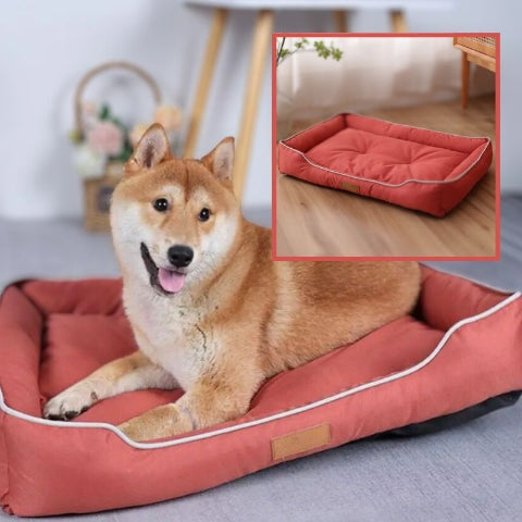 shiba inu allongé sur coussin chien rouge imperméable